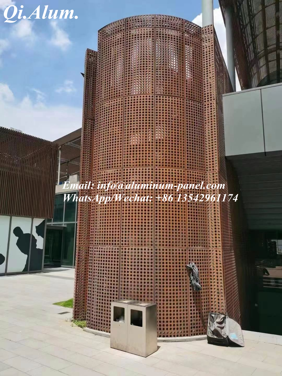 Brown aluminum punching panel are installed in the gallery curtain wall decoration